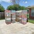 Stacked wooden beehive boxes backyard